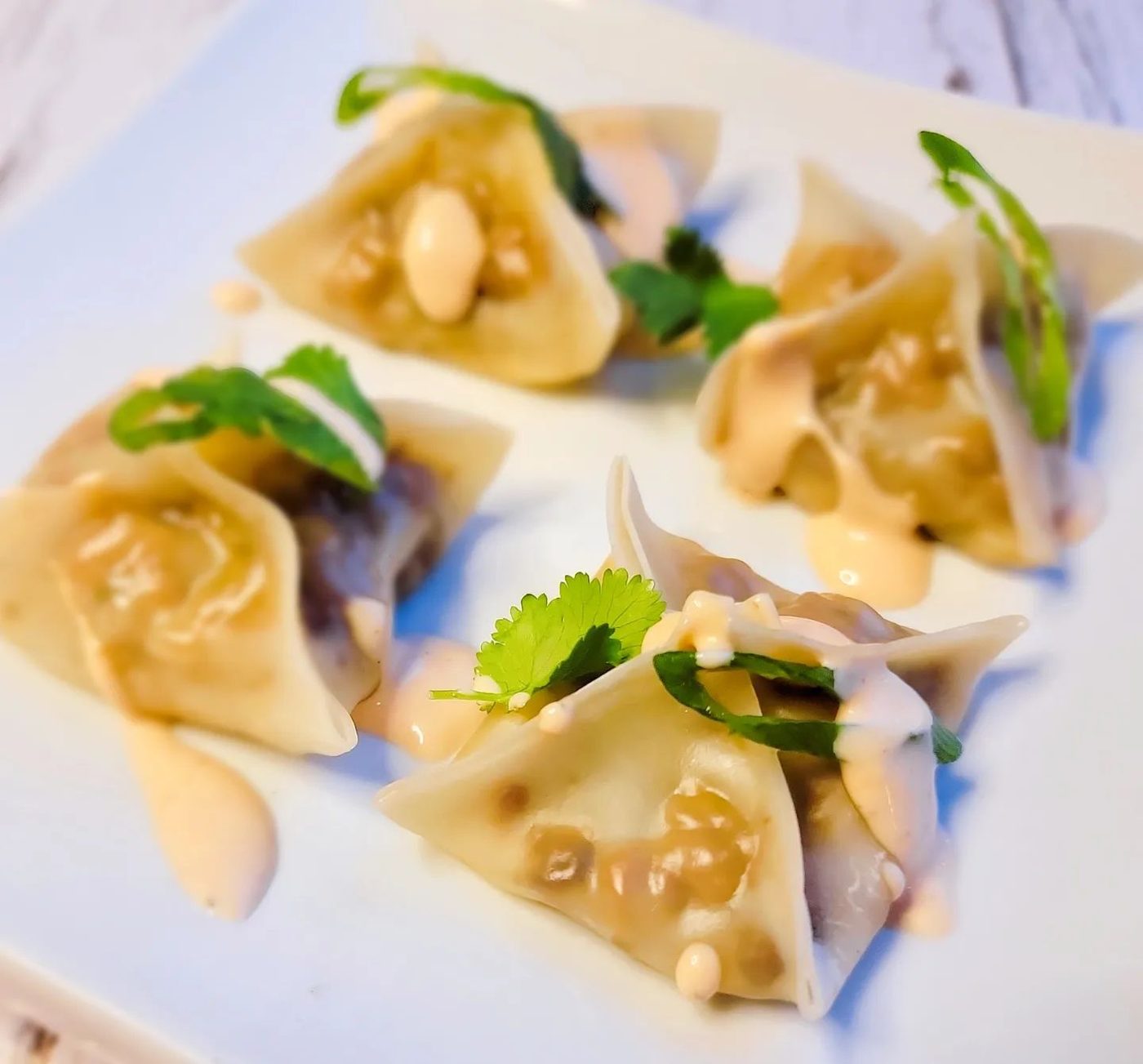 Dumplings à la brisket, sauce crémeuse